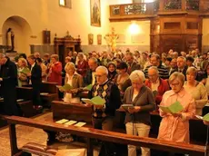 Sopra la chiesa di San Rocco ieri sera durante la veglia di preghiera per i giovani e il lavoro