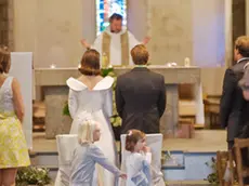 Flower girls at wedding ceremony --- Image by © Helen King/Corbis