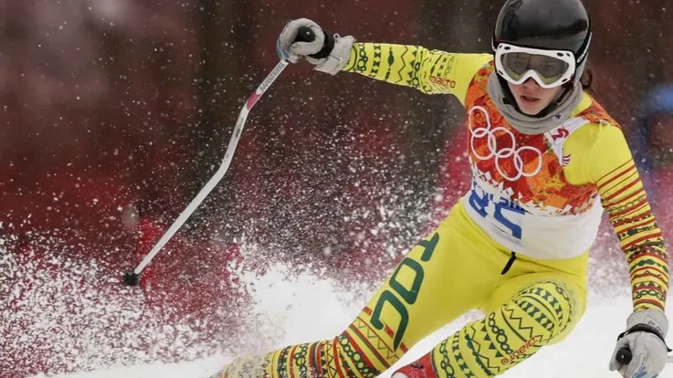 Togo's Alessia Afi Dipol makes a turn in the first run of the women's giant slalom at the Sochi 2014 Winter Olympics, Tuesday, Feb. 18, 2014, in Krasnaya Polyana, Russia. (AP Photo/Charles Krupa)