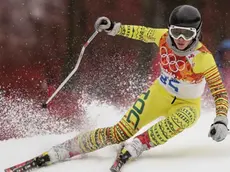 Togo's Alessia Afi Dipol makes a turn in the first run of the women's giant slalom at the Sochi 2014 Winter Olympics, Tuesday, Feb. 18, 2014, in Krasnaya Polyana, Russia. (AP Photo/Charles Krupa)