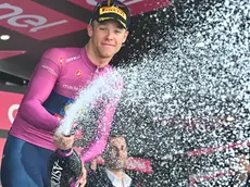 Italian rider Jonathan Milan of Lidl-Trek team retaining the points classification leader's cyclamen jersey, celebrate on the podium after 20th stage of the 107 Giro d'Italia 2024, cycling race over 184 km from Alpago to Bassano del Grappa, Italy, 25 May 2024. ANSA/LUCA ZENNARO