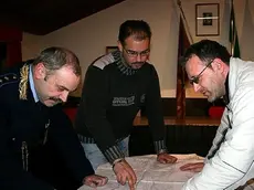 Esperti al lavoro e la cartografia di Farra