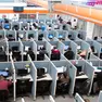 In this Aug. 13, 2014 photo, workers sit at desks at Firstkontact Center, a call center in the northern border city of Tijuana, Mexico.