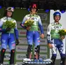 Michael Bertagno (al centro) il giorno dell'oro Mondiale
