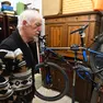 Sebastiano Visintin accanto alla sua bicicletta utilizzata il giorno della scomparsa della moglie Foto Bruni