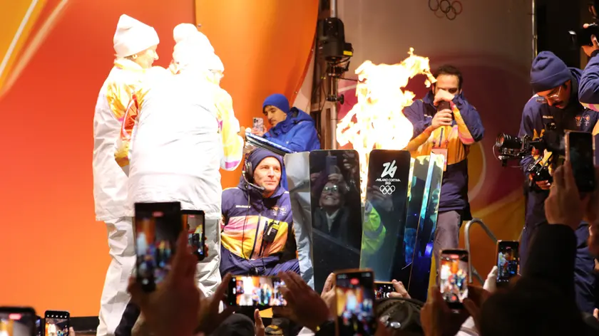 L'accensione del braciere olimpico a Cortina