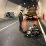 La moto distrutta dopo l'incidente in galleria