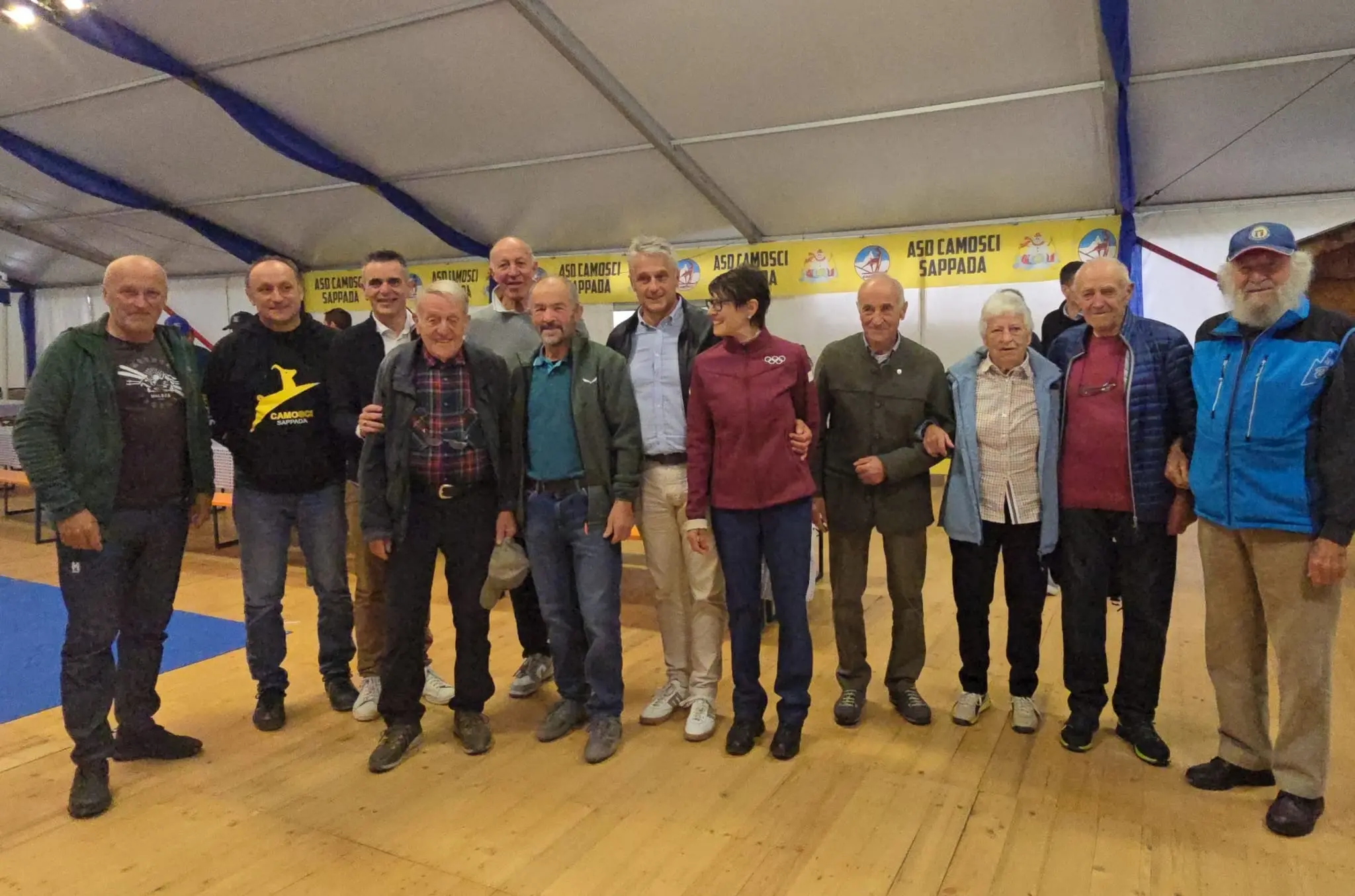 Foto della celebrazione d suo 90esimo compleanno (con Pietro Piller Cottrer, Silvio Fauner, Manuela Di Centa, Maurilio De Zolt, il figlio Ugo e la moglie Annamaria Samassa)