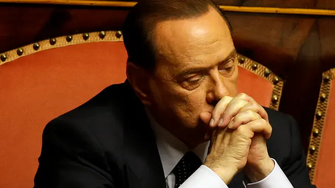 In this photo taken on Friday, July 19, 2013 Silvio Berlusconi attends a voting session at the Senate in Rome. Silvio Berlusconi, the billionaire media baron and former premier, sometimes quipped that he was running out of money after two decade of steadily paying millions of euros (dollars) to a stable of Italy's leading lawyers to defend him in a raft of criminal cases. The legal team earned its keep, either eventually scoring acquittals or devising strategies that helped stretch out the court calendar for so long the cases died when statutes of limitations ran out. But this time, they failed to deliver him from final judgment day for a guilty verdict that arrives Tuesday at Italy's highest court, and Berlusconi's no longer joking. (AP Photo/Gregorio Borgia)