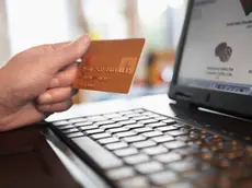 Man Shopping on Internet --- Image by © moodboard/Corbis