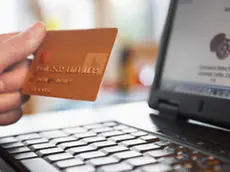 Man Shopping on Internet --- Image by © moodboard/Corbis