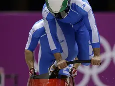 The team from Italy ITA-1, piloted by Simone Bertazzo and brakeman Simone Fontana, start their first run during the men's two-man bobsled competition at the 2014 Winter Olympics, Sunday, Feb. 16, 2014, in Krasnaya Polyana, Russia. (AP Photo/Dita Alangkara)