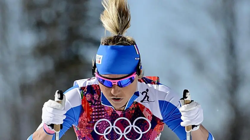 epa04073789 Marina Piller of Italy in action during the Women's 10km Classic competition at the Laura Cross Country Center during the Sochi 2014 Olympic Games, Krasnaya Polyana, Russia, 13 February 2014. EPA/FILIP SINGER