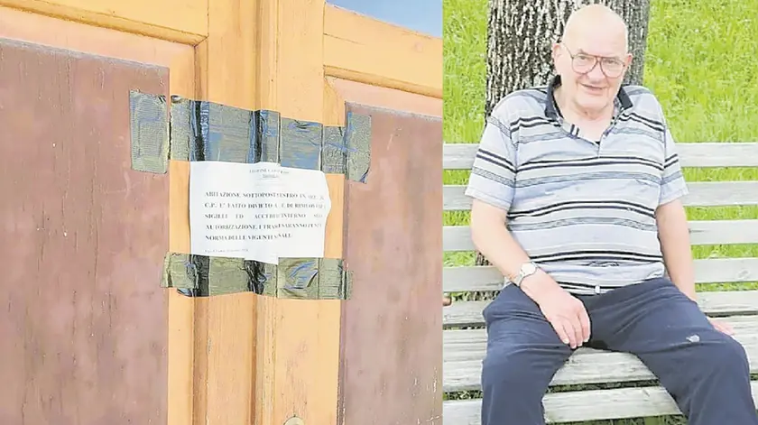Angelo Mainardi e i sigilli sul portone della casa da cui sono entrati i banditi