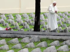 Pope Francis visits the Austro-Hungarian cemetery in Fogliano to pray and pay a tribute to the fallen on the battlefield during the First World War before celebrating a solemn mass at the war memorial at Redipuglia to mark the 100th anniversary of the start of the First World War, 13 September 2014. ANSA/DANIEL DAL ZENNARO