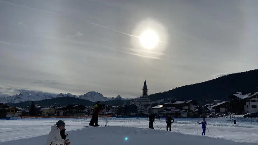 Fondisti impegnati a Padola di Comelico Superiore durante una passata stagione invernale