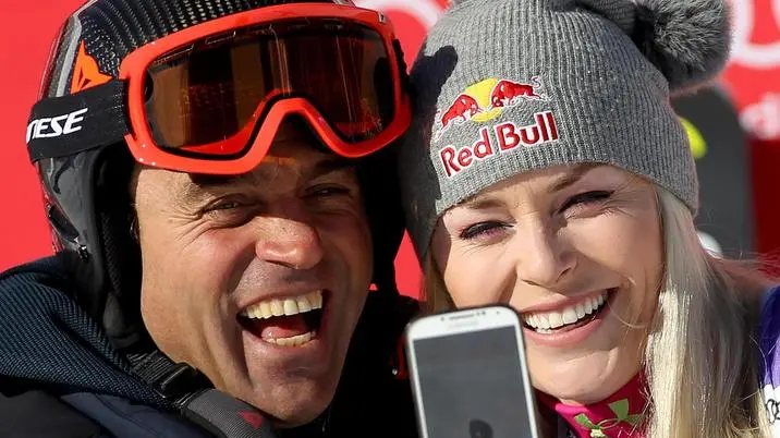 Winner Lindsey Vonn (R) of the US with Italian skier Kristian Ghedina take a selfie in the finish area after the women's Downhill race at the FIS Alpine Ski World Cup in Cortina d'Ampezzo, Italy, 20 January 2018. ANSA/ANDREA SOLERO
