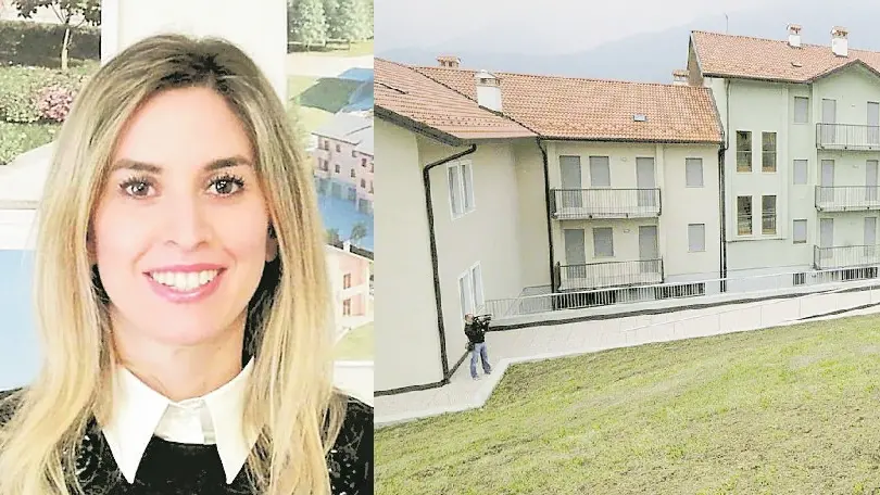 Un complesso abitativo dell’Ater a Belluno. A sinistra la presidente Ilenia Rento