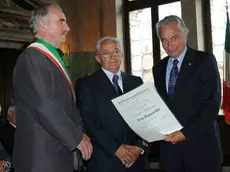 Luigi Francavilla con il sindaco di Agordo e il presidente della Camera di Commercio