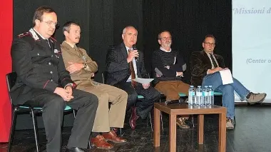 I relatori, a destra il pubblico all’auditorium del Canossiano