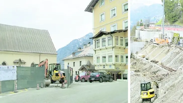 I lavori avviati in piazza a Pieve di Livinallongo e a destra il cantieri riaperto da val del Hotel per la realizzazione del parcheggio