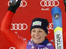 Elena Fanchini of Italy celebrates on the podium after the women's FIS Alpine Skiing World Cup Downhill race in Cortina d'Ampezzo, Italy, 16 January 2015. Fanchini won the race. ANSA/ANDREA SOLERO