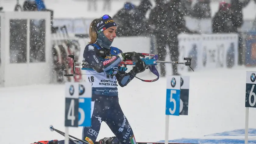 epa08292805 Lisa Vittozzi of Italy in action during the women's 7.5km Sprint competition of the IBU Biathlon World Cup in Kontiolahti, Finland, 13 March 2020. EPA/KIMMO BRANDT