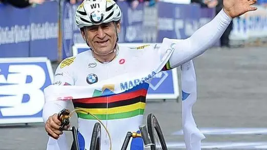 Italian Alex Zanardi celebrates has he finish the Rome Marathon race in Rome, Italy, 23 March 2014..ANSA/MARATONA DI ROMA- EDITORIAL USE ONLY