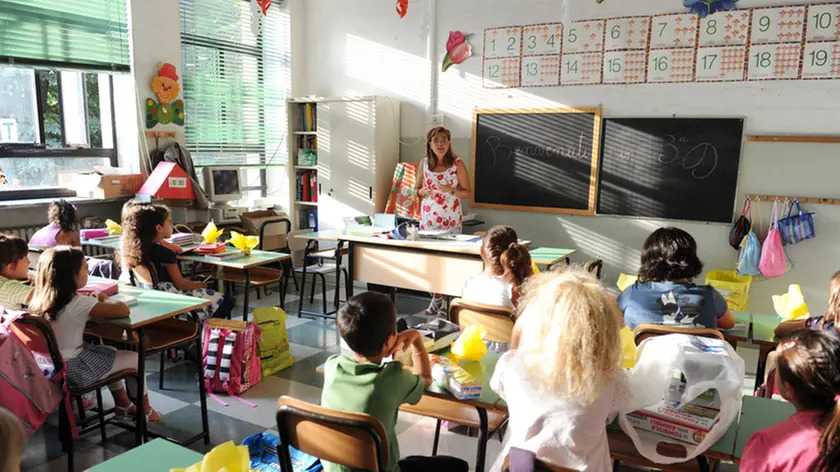 Il primo giorno di scuola per gli alunni dell'Istituto Comprensivo Padre Gemelli di Torino, 12 settembre 2011. ANSA / DI MARCO