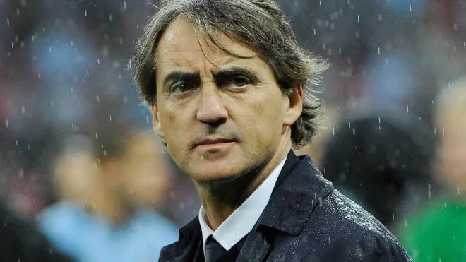 epa03697468 (FILE) A file photograph dated 11 May 2013 shows Manchester City's manager Roberto Mancini reacting after losing the English FA Cup final soccer match between Manchester City and Wigan Athletic at Wembley Stadium in London, Britain. British media reports on 12 May 2013 state that Roberto Mancini is set to be sacked as manager of Manchester City. EPA/ANDY RAIN