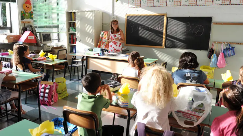 Il primo giorno di scuola per gli alunni dell'Istituto Comprensivo Padre Gemelli di Torino, 12 settembre 2011. ANSA / DI MARCO