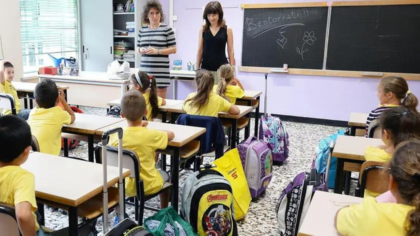 Bambini della scuola elementare Del Piaz si preparano ad iniziare il nuovo anno scolasticoa Torino, 12 Settembre 2016. ANSA/ ALESSANDRO DI MARCO