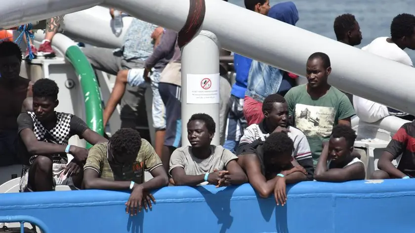 650 migrants, rescued in Mediterranean Sea off the Libyan coast, ready to disembark from Swedish ship Frontex in Catania, 1 July 2017. Nine migrants are found dead. ANSA/ORIETTA SCARDINO