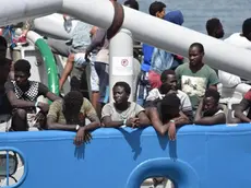 650 migrants, rescued in Mediterranean Sea off the Libyan coast, ready to disembark from Swedish ship Frontex in Catania, 1 July 2017. Nine migrants are found dead. ANSA/ORIETTA SCARDINO