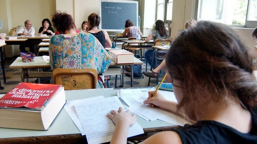 18/06/03 SCUOLA LICEO SCIENTIFICO RIGHI ESAMI DI MATURITA' PROVA SCRITTA DI ITALIANO .