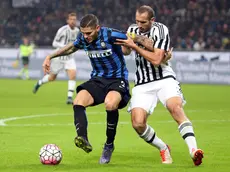 Mauro Icardi e Giorgio Chiellini durante Inter-Juventus