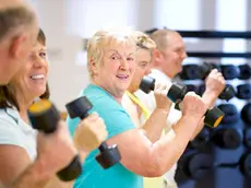 seniors having fun in the gym