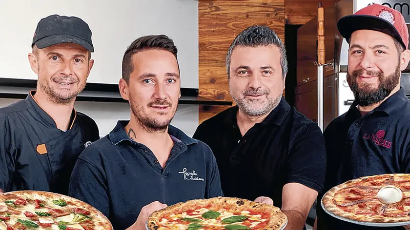 Stefano (pizzeria Alpina), Simone (Locanda Al Cacciatore), Luca (Pizza Speedy) e Filippo (La Noghera)