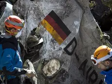 ©Yves Malenfer /MAXPPP - Handout pictures dated March 31, 2015 shows members of the French national gendarmerie investigating the area after the A320 Germanwings passenger aircraft crashed in a mountain range of the French Alps. The plane heading to Dusseldorf from Barcelona with 150 people onboard was allegedly taken down by its co-pilot Andreas Lubitz, there were no survivors. Lapresse Only italy..Airbus Germanwings: continuano le ricerche sul luogo del disastro