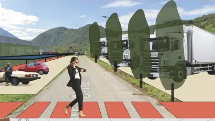 Un rendering del masterplan: come apparirebbe via Camp Lonc in zona industriale a Villapaiera con parcheggi per auto e camion