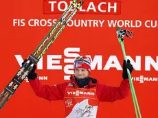 Winner Martin Johnsrud Sundby of Norway celebrates on the podium after the men's 35km Free Pursuit race at the Tour de Ski Cross-Country World Cup event in Dobbiaco, Italy, 3 January 2014. ANSA/ANDREA SOLERO