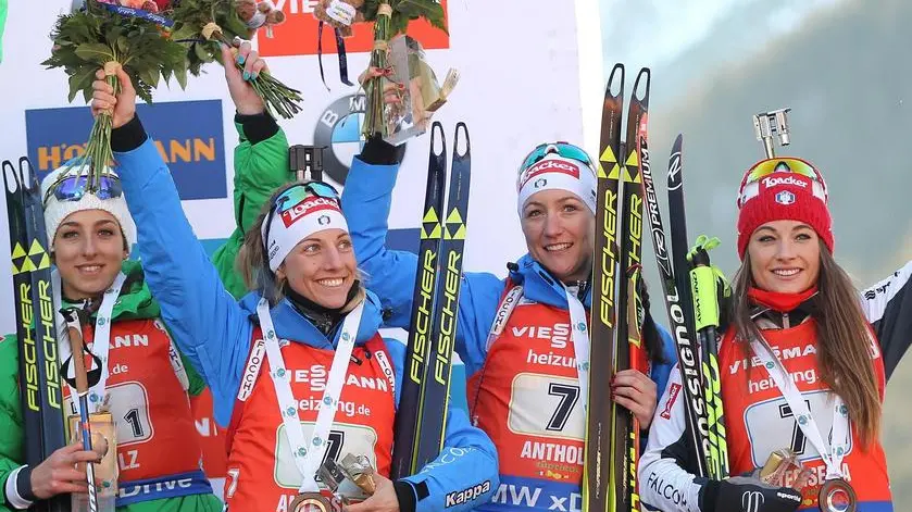 (L-R) Lisa Vittozzi, Federica Sanfilippo, Alexia Runggaldier, Dorothea Wierer of Italy celebrate on the podium after the women's 4x6km Relay race of the Biathlon World Cup in Antholz-Anterselva, Italy, 22 January 2017. ANSA/ANDREA SOLERO